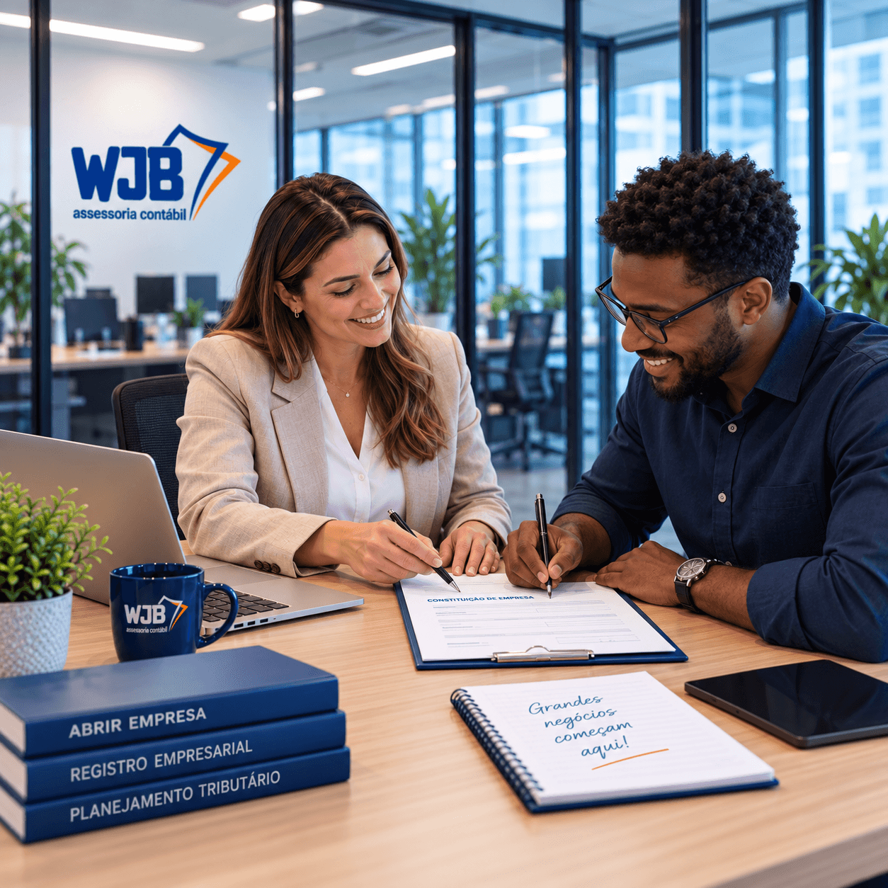 Consultora da WJB e cliente assinando o documento de constituição de empresa, com livros sobre abertura e registro empresarial na mesa